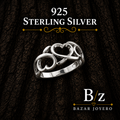 925 Sterling Silver Open Heart Ring on Dark Bark Background