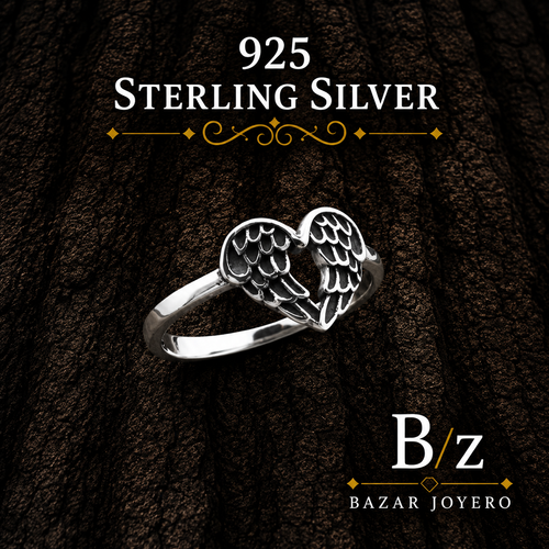 925 Sterling Silver Angel Wings Heart Ring on bark background