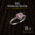 925 Sterling Silver Pink Heart CZ Halo Ring on bark background