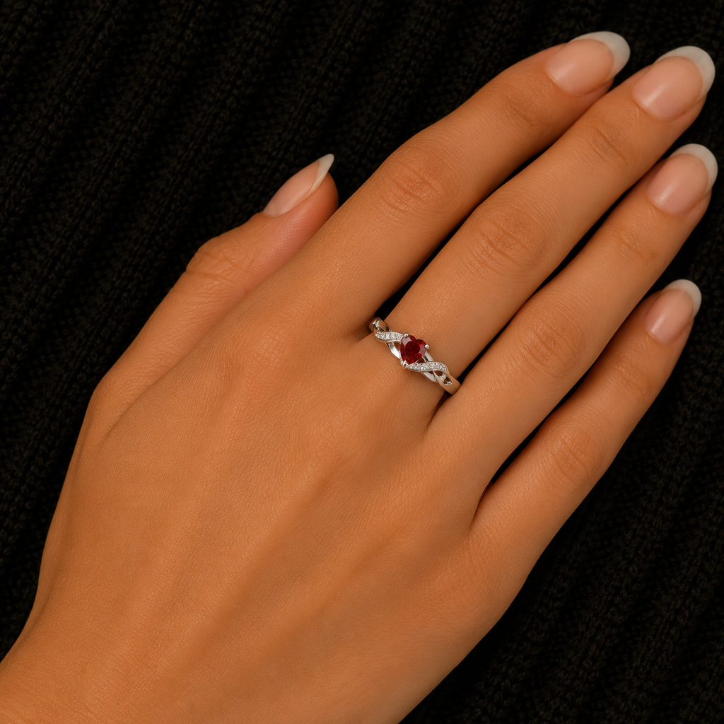 925 Sterling Silver Heart Garnet CZ Ring worn on woman's hand