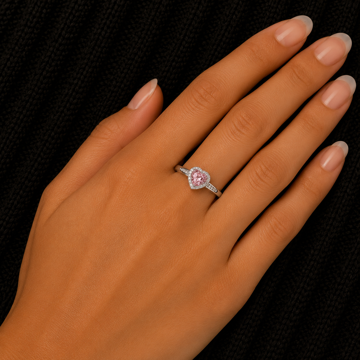 925 Sterling Silver Pink Heart CZ Halo Ring worn on woman's hand