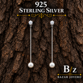 925 sterling silver long pearl drop earrings with clear cubic zirconia accent, front product view.