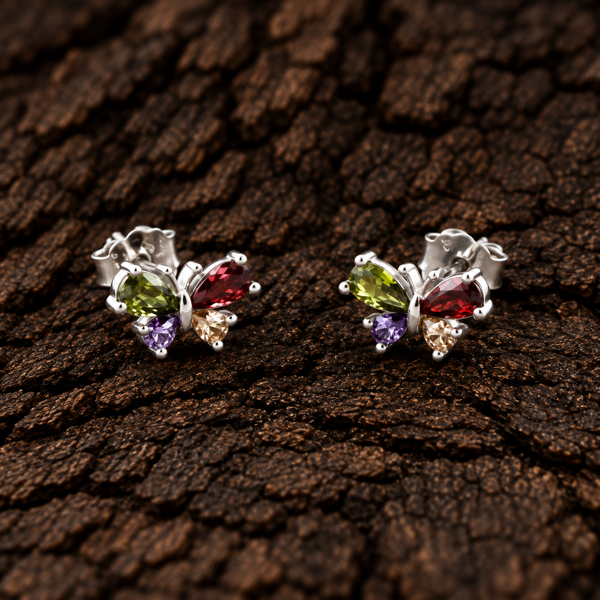 Multicolor butterfly 925 sterling silver earrings with colorful teardrop-cut stones.