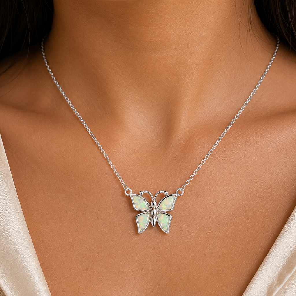 Close-up of White Lab Opal Butterfly Necklace worn on neck
