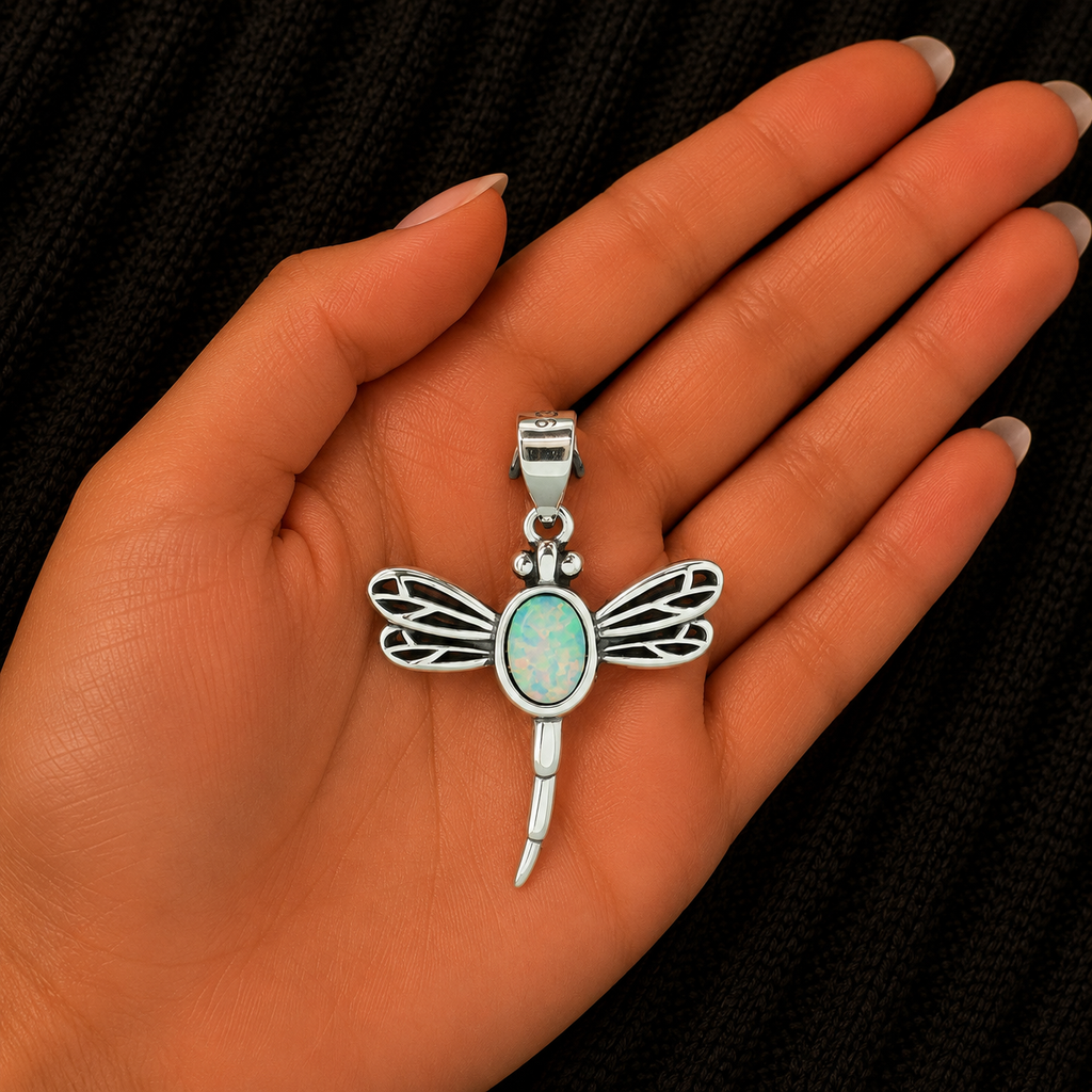 925 Sterling Silver Dragonfly Pendant with Lab Opal shown in hand for size reference