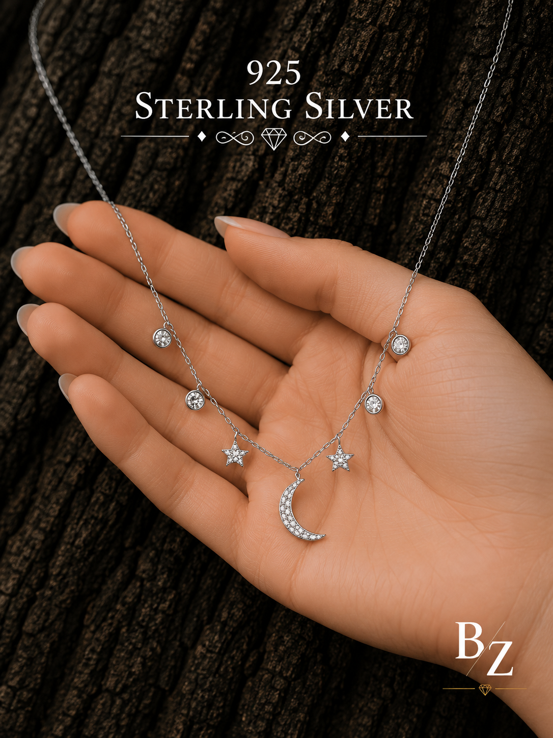 925 Sterling Silver Moon & Stars Necklace shown in hand for size reference