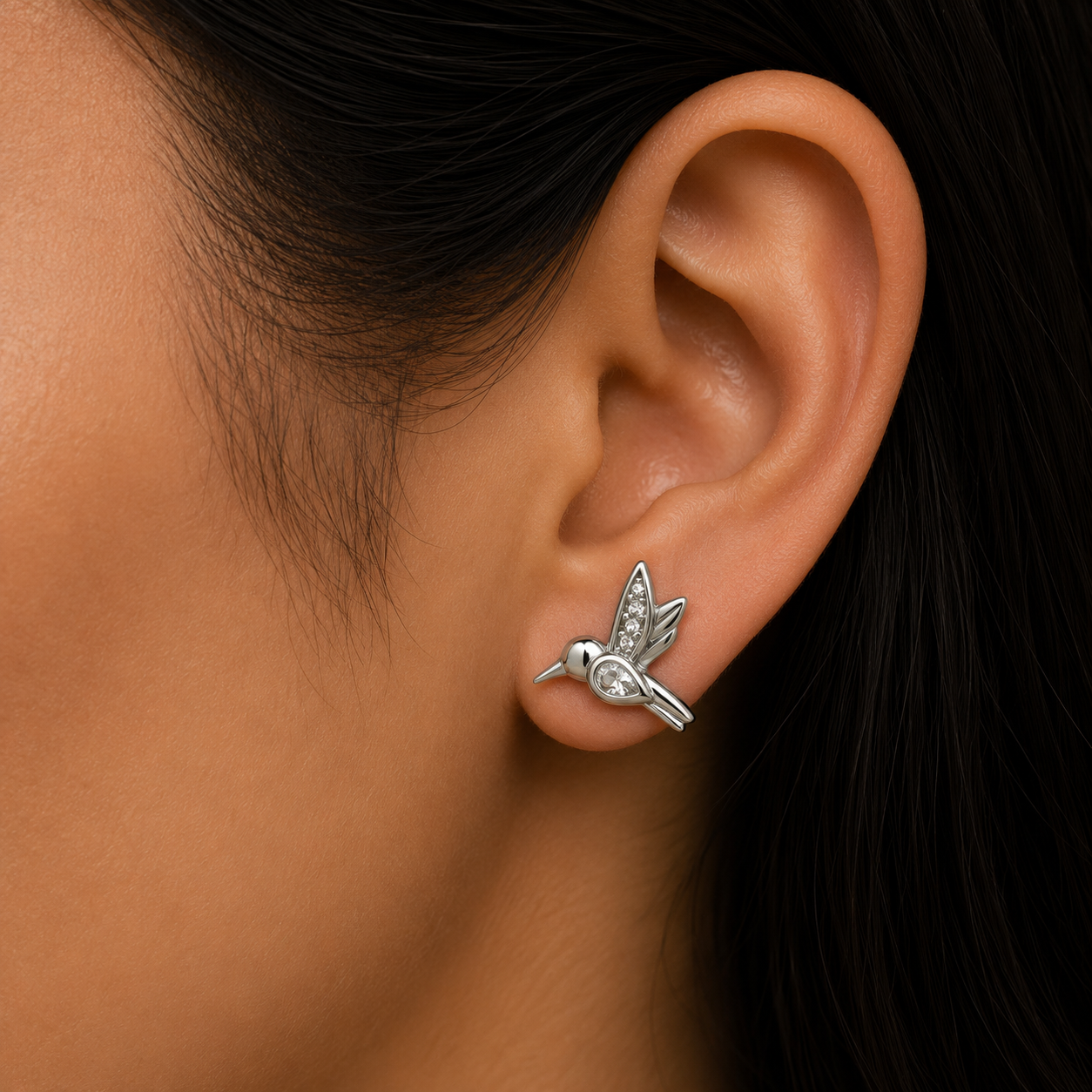 Woman wearing 925 Sterling Silver Hummingbird Stud Earrings