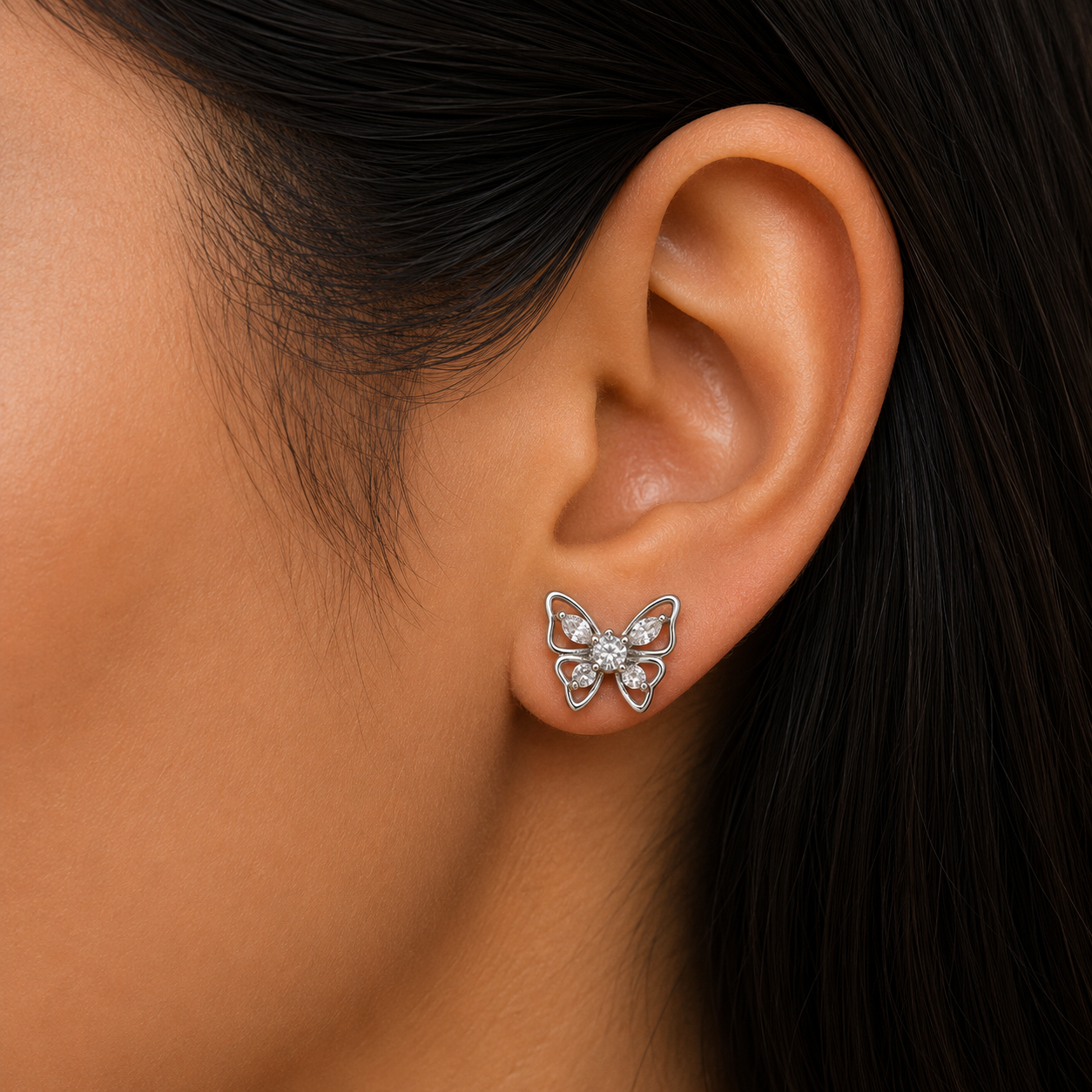 Woman wearing 925 Sterling Silver Butterfly Stud Earrings