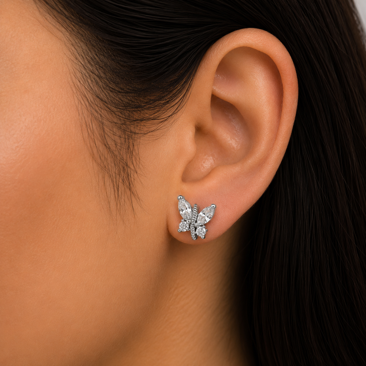 Woman wearing 925 Sterling Silver Butterfly Stud Earrings
