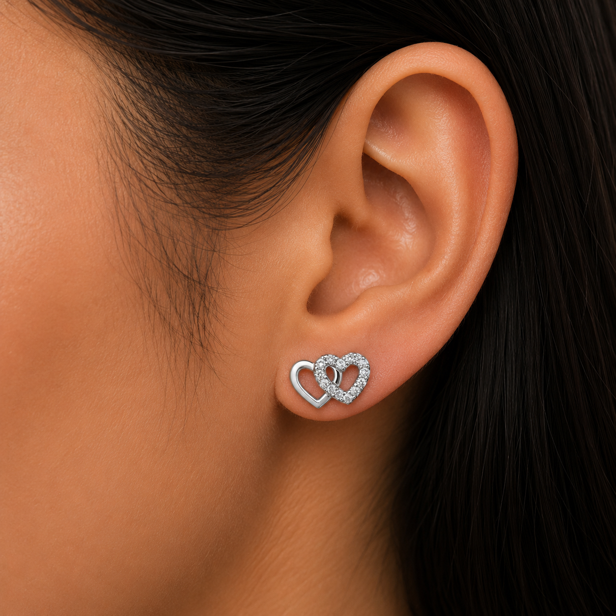 Woman wearing 925 Sterling Silver Double Heart Stud Earrings