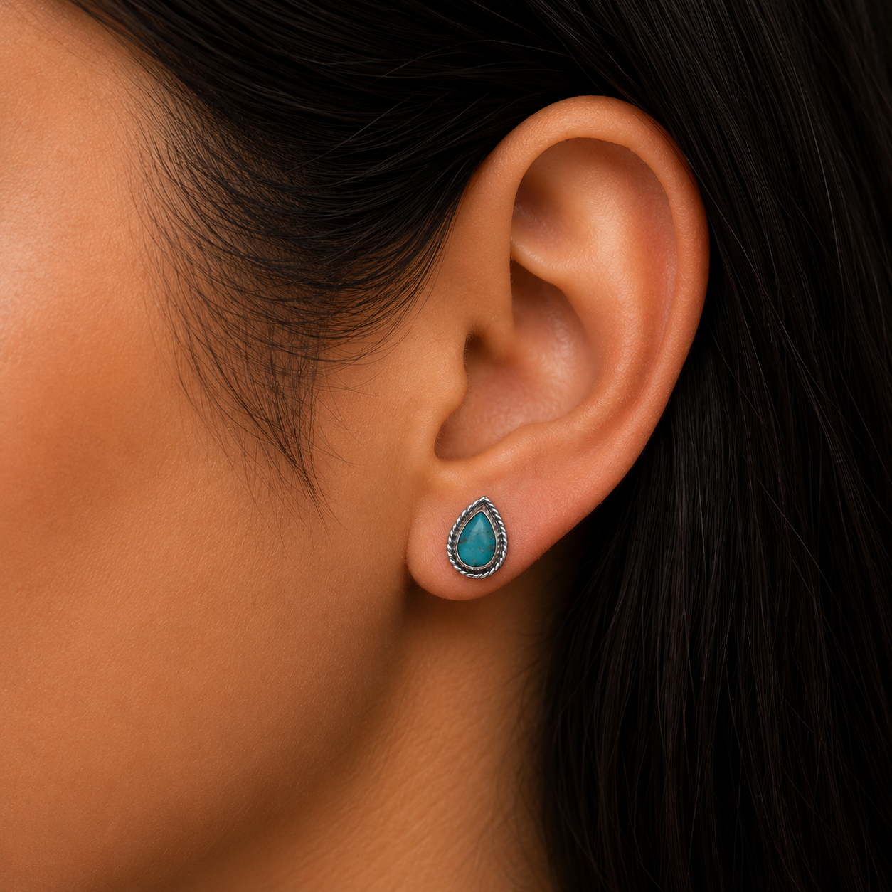 Woman wearing 925 Sterling Silver Teardrop Stud Earrings