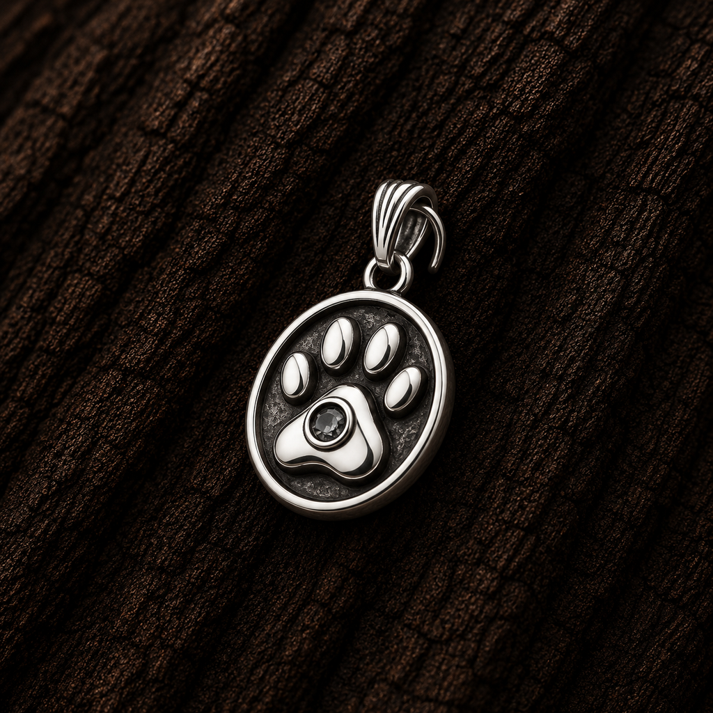 Close-up of 925 Sterling Silver Paw Print Pendant with Cubic Zirconia