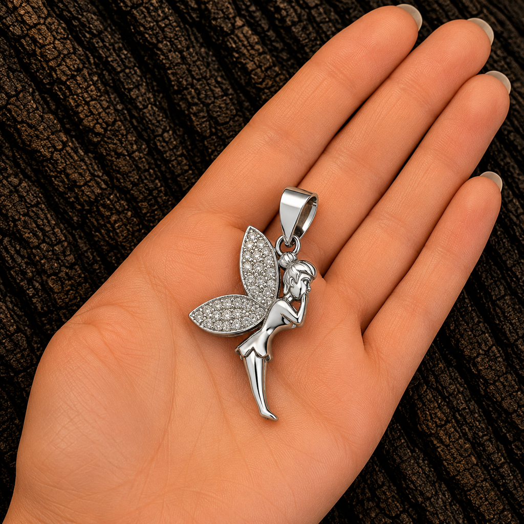925 Sterling Silver Fairy Pendant shown in hand for size reference