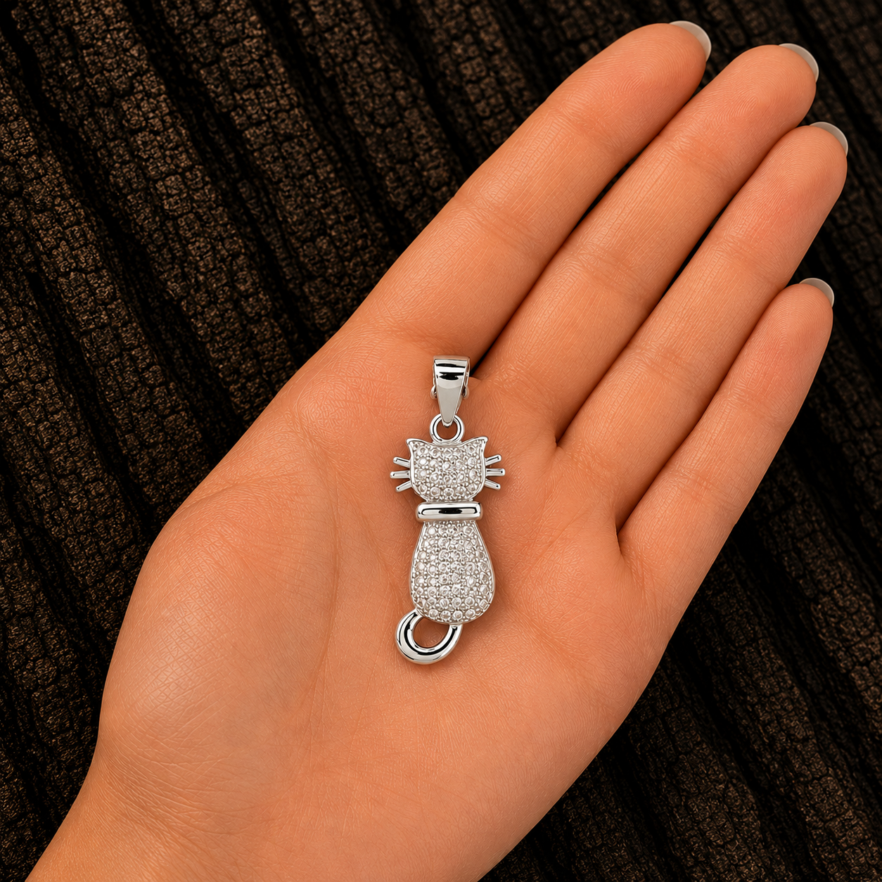 925 Sterling Silver Cat Pendant shown in hand for size reference