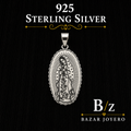Our Lady of Guadalupe 925 sterling silver pendant featuring detailed floral artwork and a classic devotional design.
